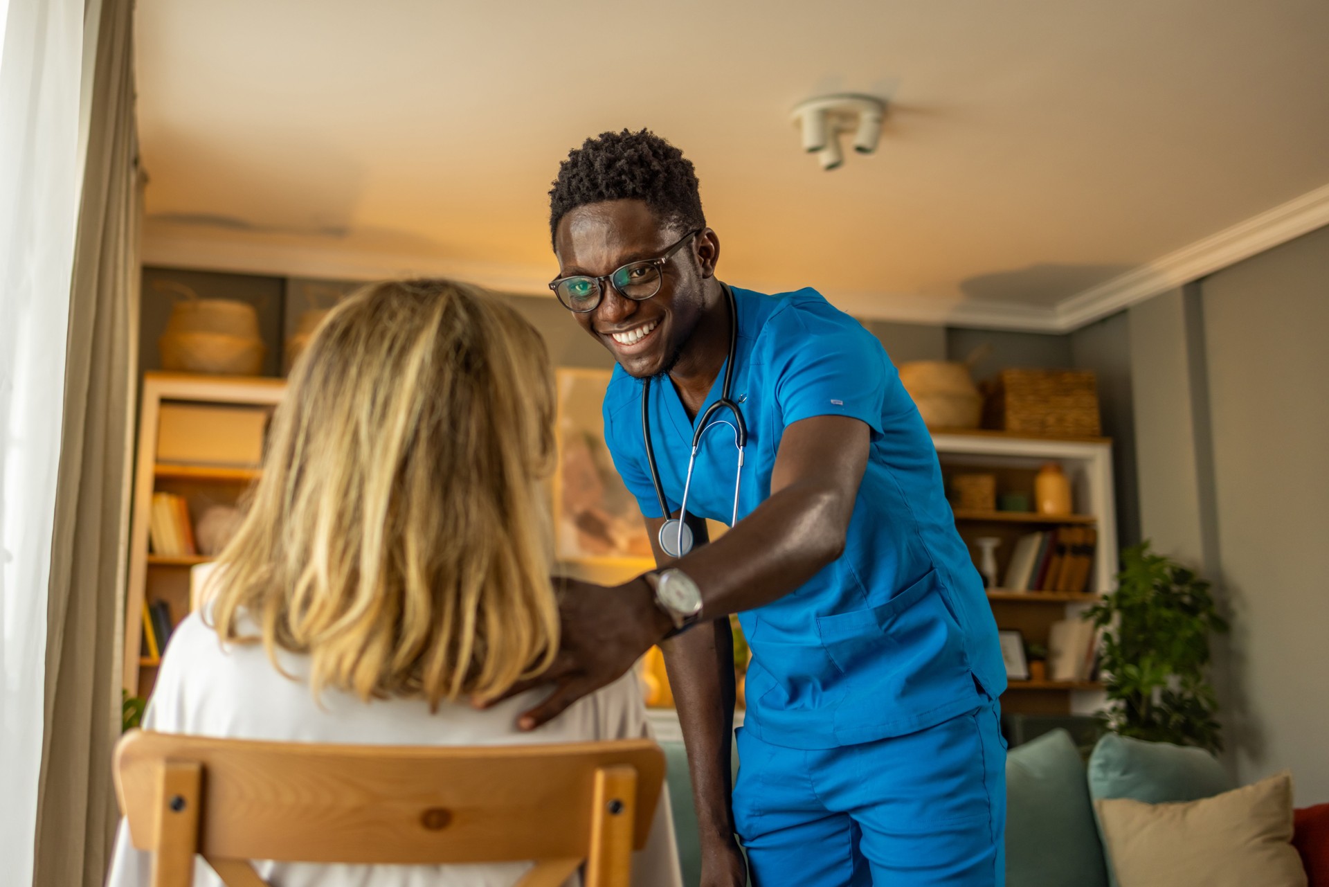 A senior woman at home receiving healthcare.